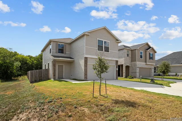 a house view with a swimming pool