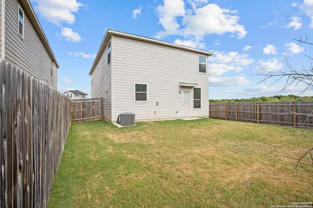 a view of backyard of house