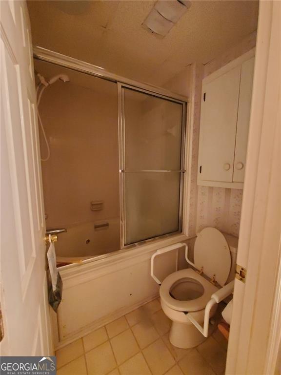 1116 Cody Road Mount Airy, GA 30563 - Photo 21 of 39 a bathroom with a granite countertop bathtub shower sink and toilet