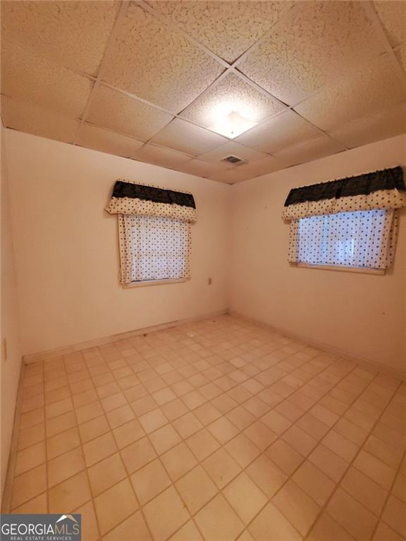 1116 Cody Road Mount Airy, GA 30563 - Photo 22 of 39 an empty room with windows
