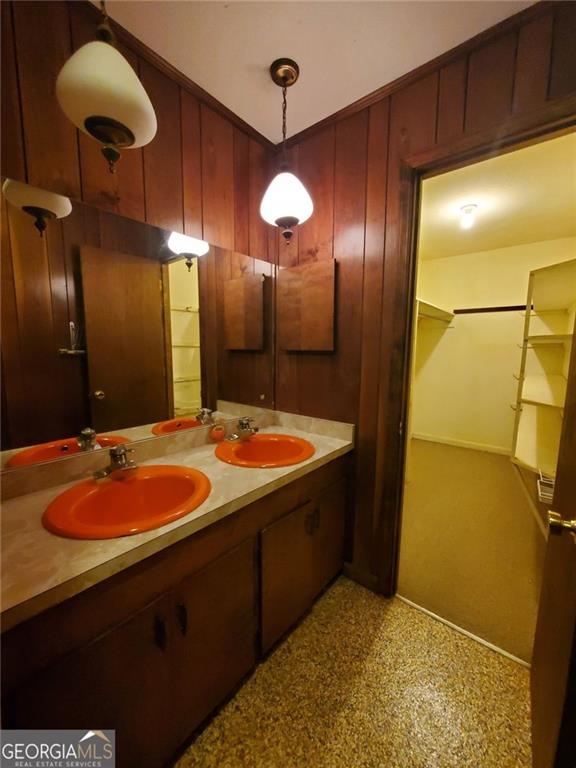1116 Cody Road Mount Airy, GA 30563 - Photo 25 of 39 a bathroom with a sink and a mirror