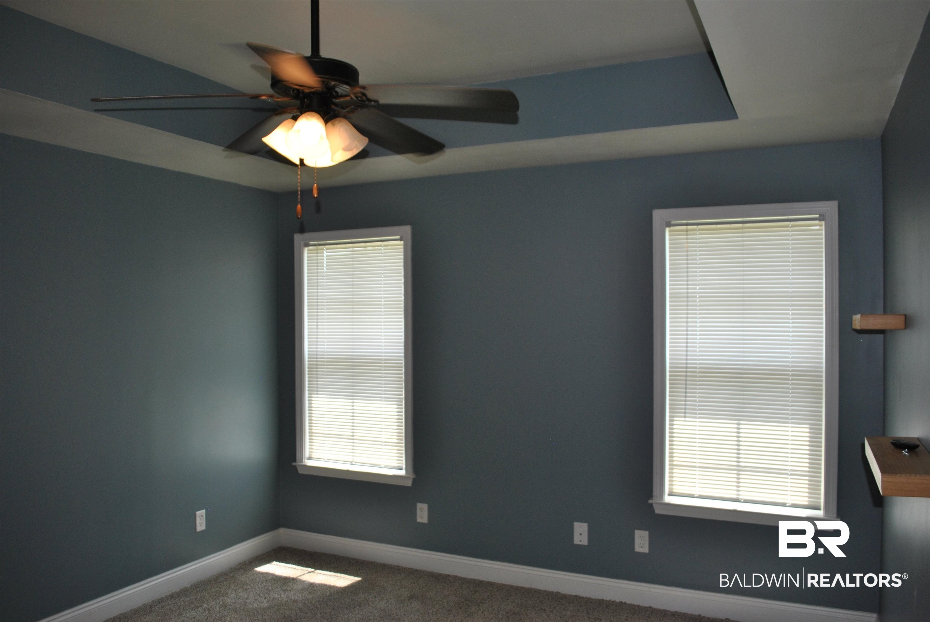 2161 Spring Grove West Mobile, AL 36695 - Photo 22 of 31 Empty room with ceiling fan and carpet