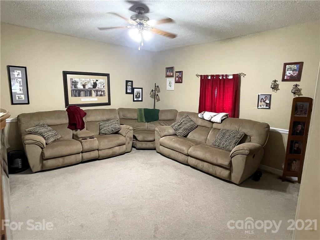 2320 Tribal Road Lancaster, SC 29720 - Photo 22 of 36 a living room with furniture and a couch