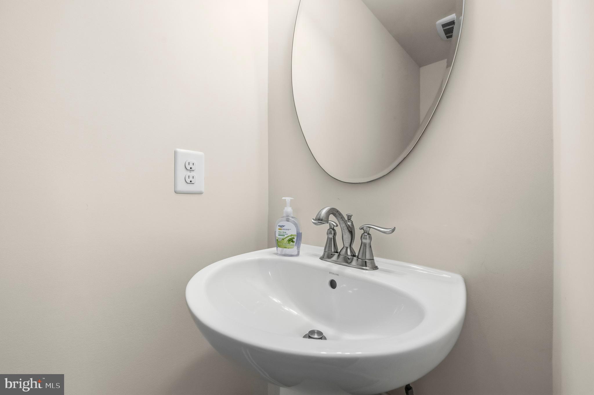 617 Potomac View Parkway Brunswick, MD 21716 - Photo 23 of 48 a bathroom with a sink and a mirror