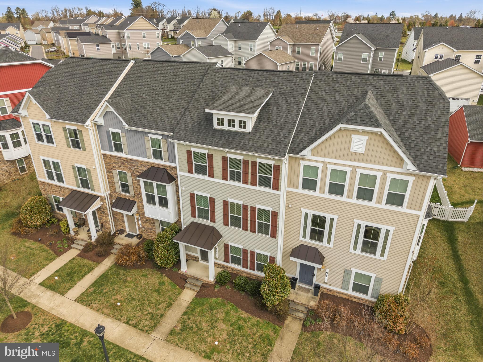 617 Potomac View Parkway Brunswick, MD 21716 - Photo 29 of 48 an aerial view of a residential apartment building with a yard