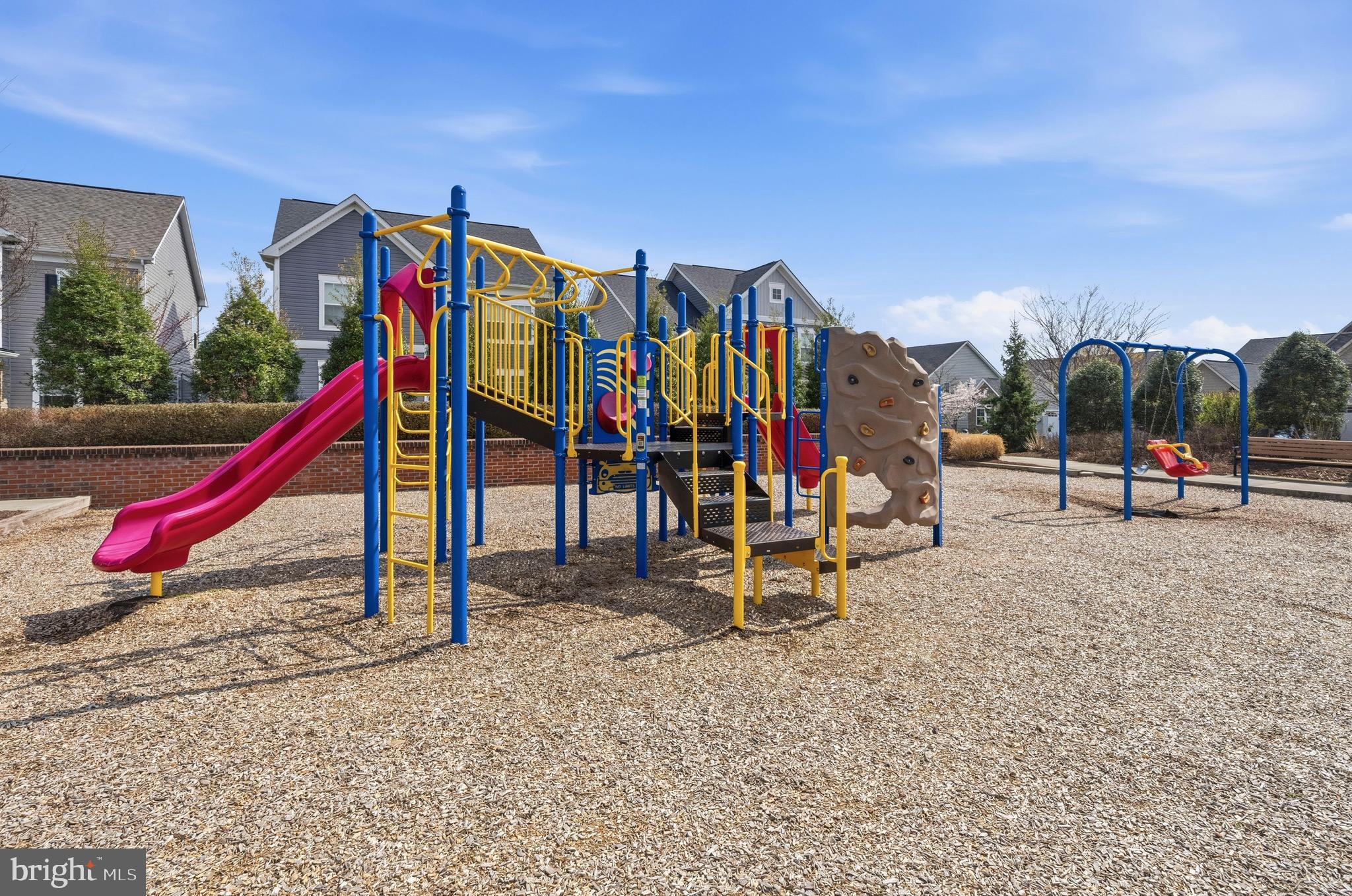 617 Potomac View Parkway Brunswick, MD 21716 - Photo 36 of 48 a view of a park with swings and slides