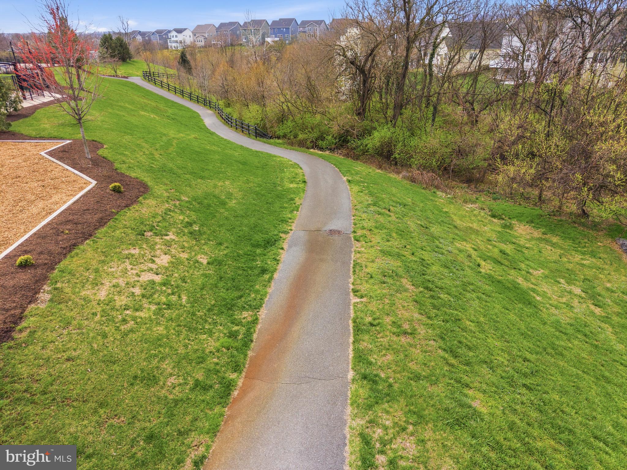617 Potomac View Parkway Brunswick, MD 21716 - Photo 39 of 48 a view of a pathway both side of green field