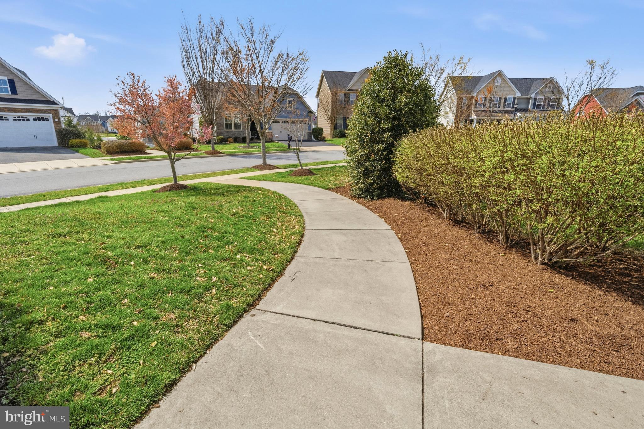 617 Potomac View Parkway Brunswick, MD 21716 - Photo 48 of 48 a view of a garden with a building in the background