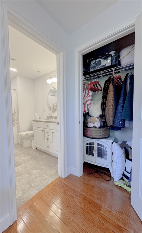18 Eagle Nest Road, Unit 331 Clinton, MA 01510 - Photo 14 of 28 a view of walk in closet with clothes and shoes