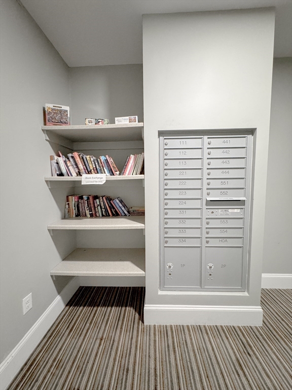 18 Eagle Nest Road, Unit 331 Clinton, MA 01510 - Photo 20 of 28 a view of a room with wooden floor