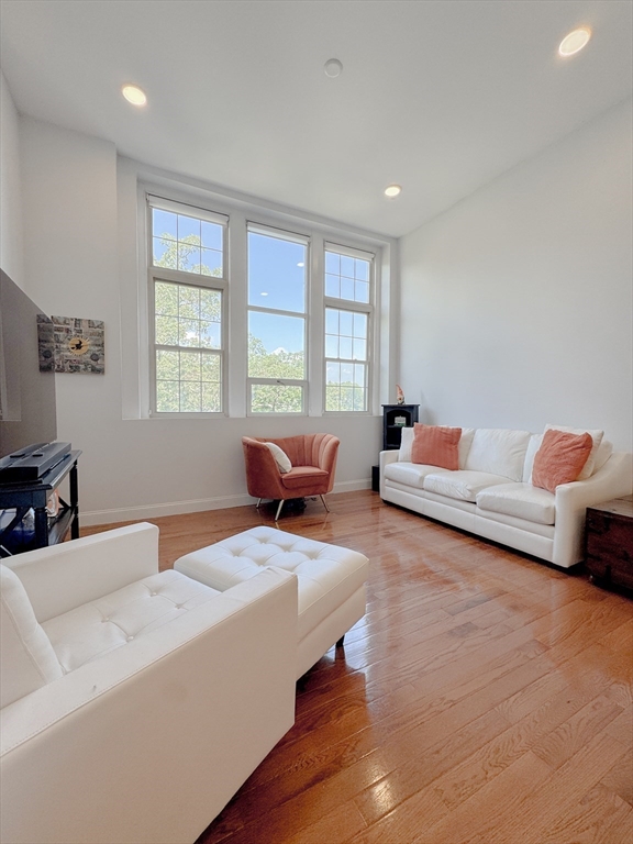 18 Eagle Nest Road, Unit 331 Clinton, MA 01510 - Photo 4 of 28 a living room with furniture and a large window