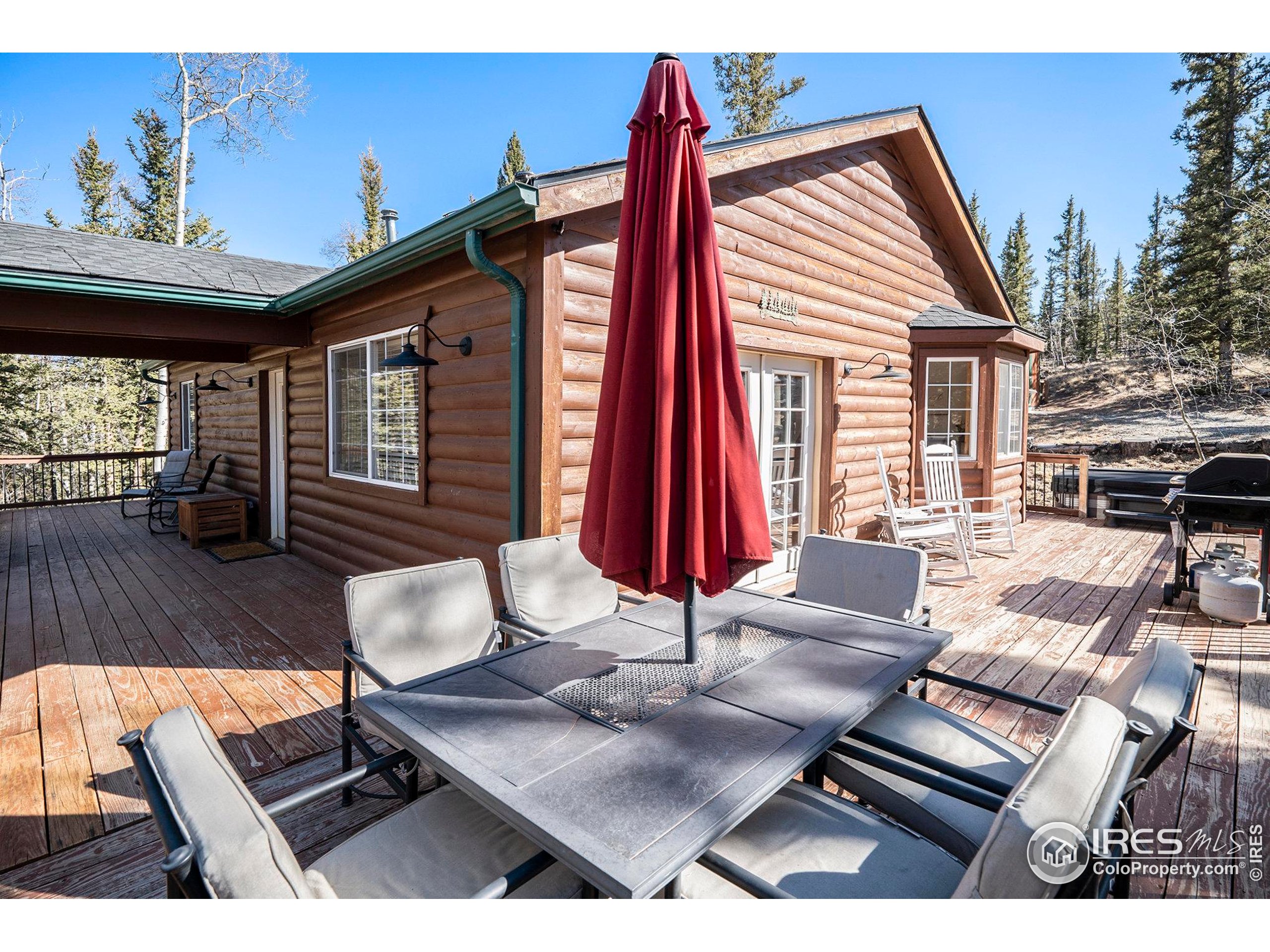 654 Piaute Way Como, CO 80432 - Photo 20 of 25 a view of backyard with a patio and outdoor seating