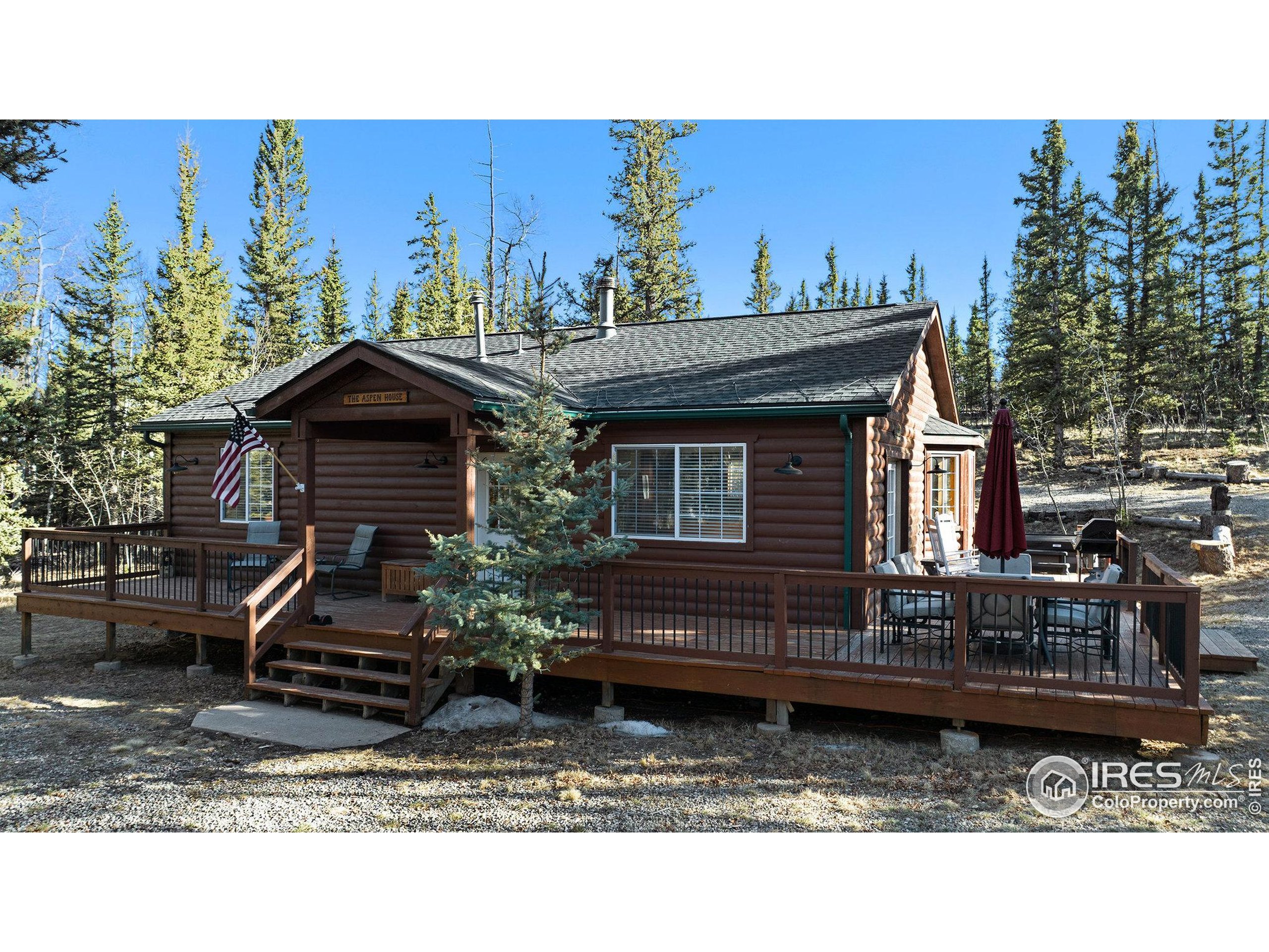 654 Piaute Way Como, CO 80432 - Photo 2 of 25 a view of a house with a yard