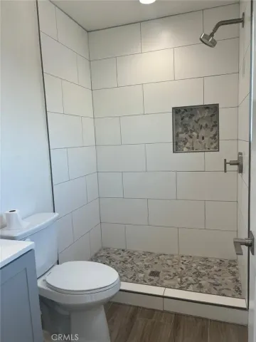 a bathroom with a toilet and a sink