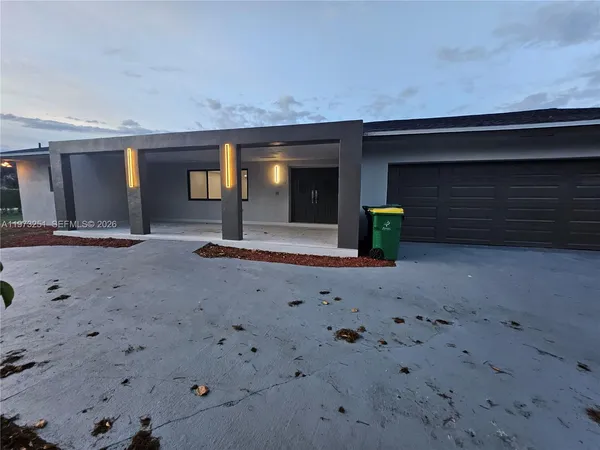 a house view with a outdoor space