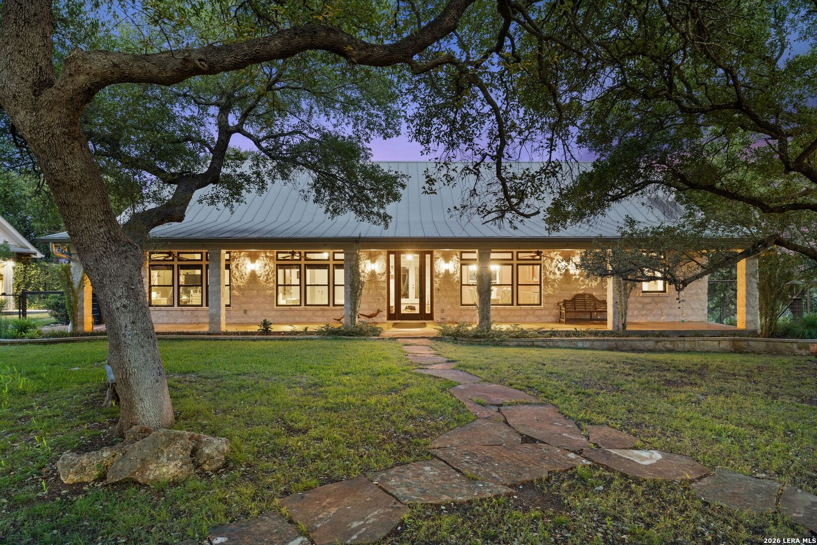 7855 Middle Creek Road Blanco, TX 78606 - Photo 57 of 57 a view of a big yard with plants and large trees