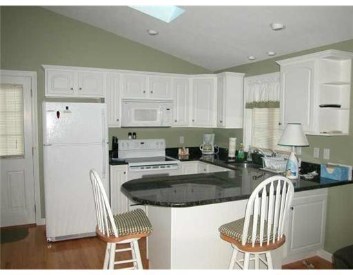 1413 Post Road, Unit 9 Wells, ME 04090 - Photo 3 of 10 Kitchen. A fully appliance kitchen...