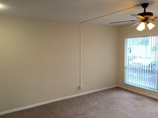 4850 Northeast 5th Avenue, Unit 108 Boca Raton, FL 33431 - Photo 4 of 16 Large windows in living room