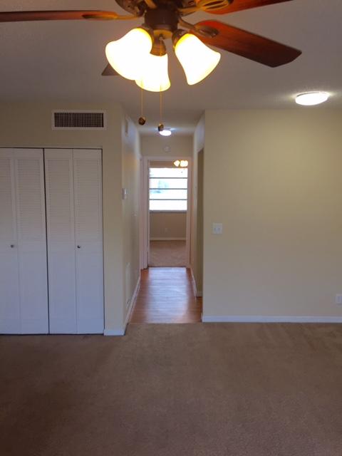 4850 Northeast 5th Avenue, Unit 108 Boca Raton, FL 33431 - Photo 7 of 16 Long Hallway