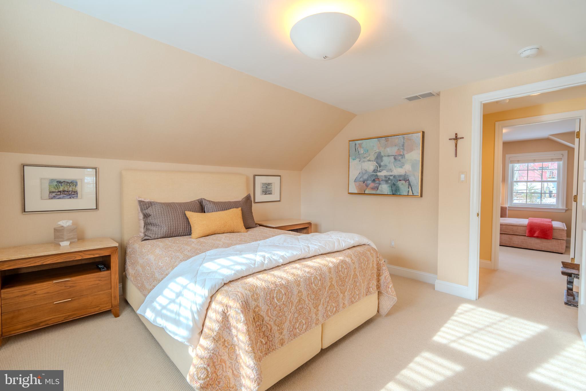 173 Hillview Drive Springfield, PA 19064 - Photo 16 of 50 a spacious bedroom with a bed and a couch