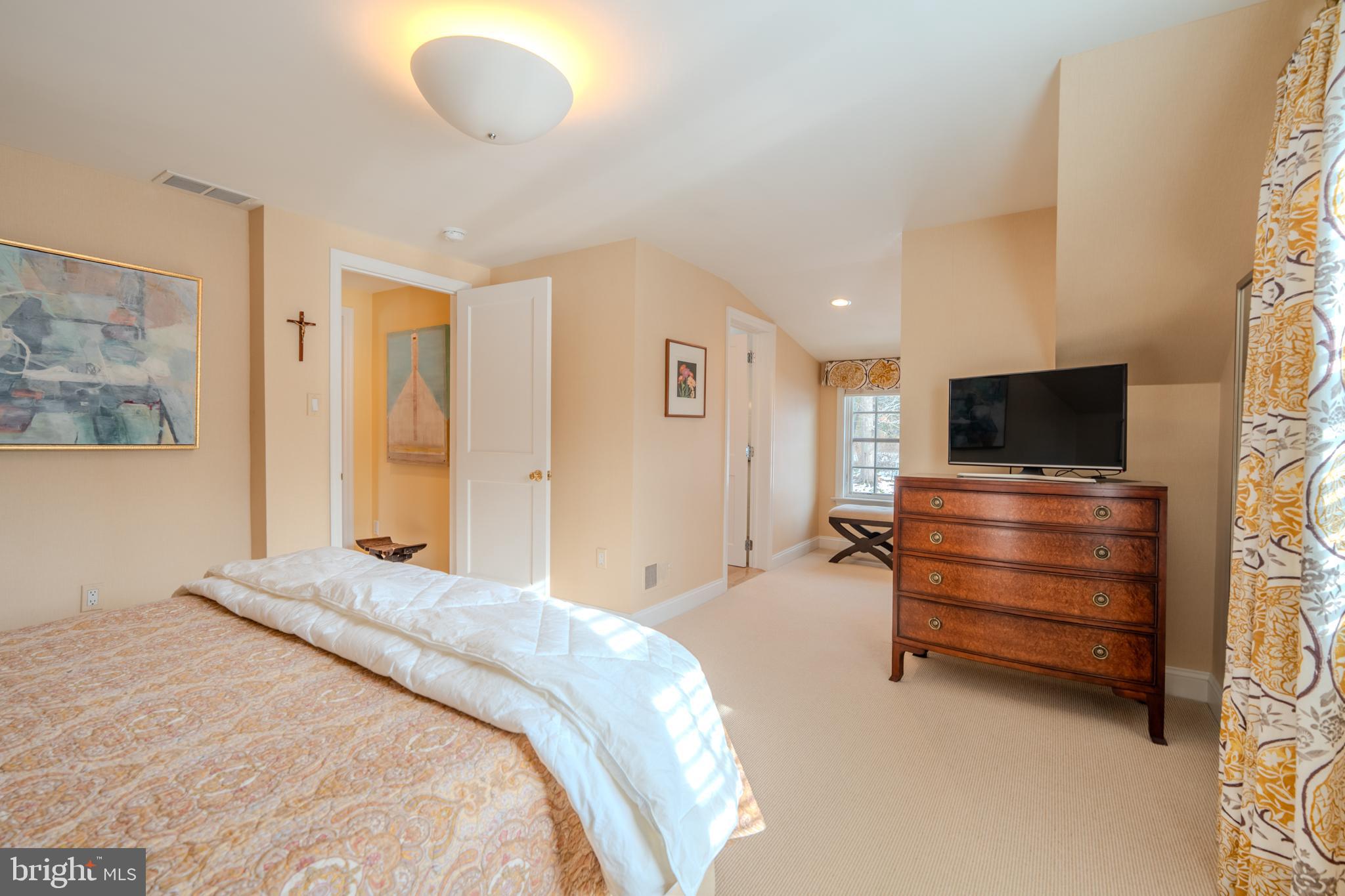 173 Hillview Drive Springfield, PA 19064 - Photo 18 of 50 a bedroom with a bed and flat screen tv