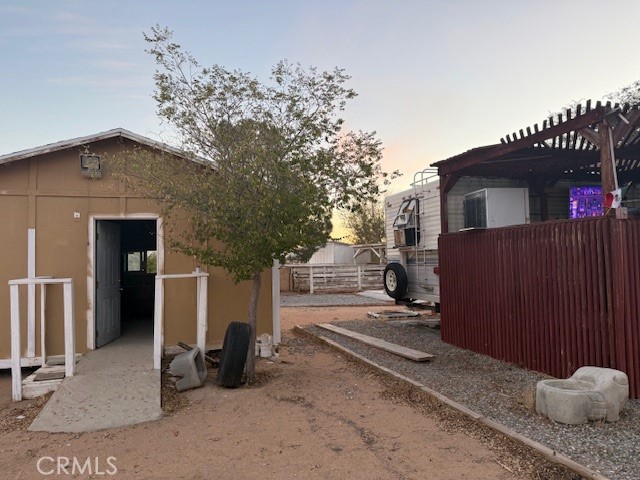 16100 Navajo Road Apple Valley, CA 92307 - Photo 23 of 55 a view of a house with a patio