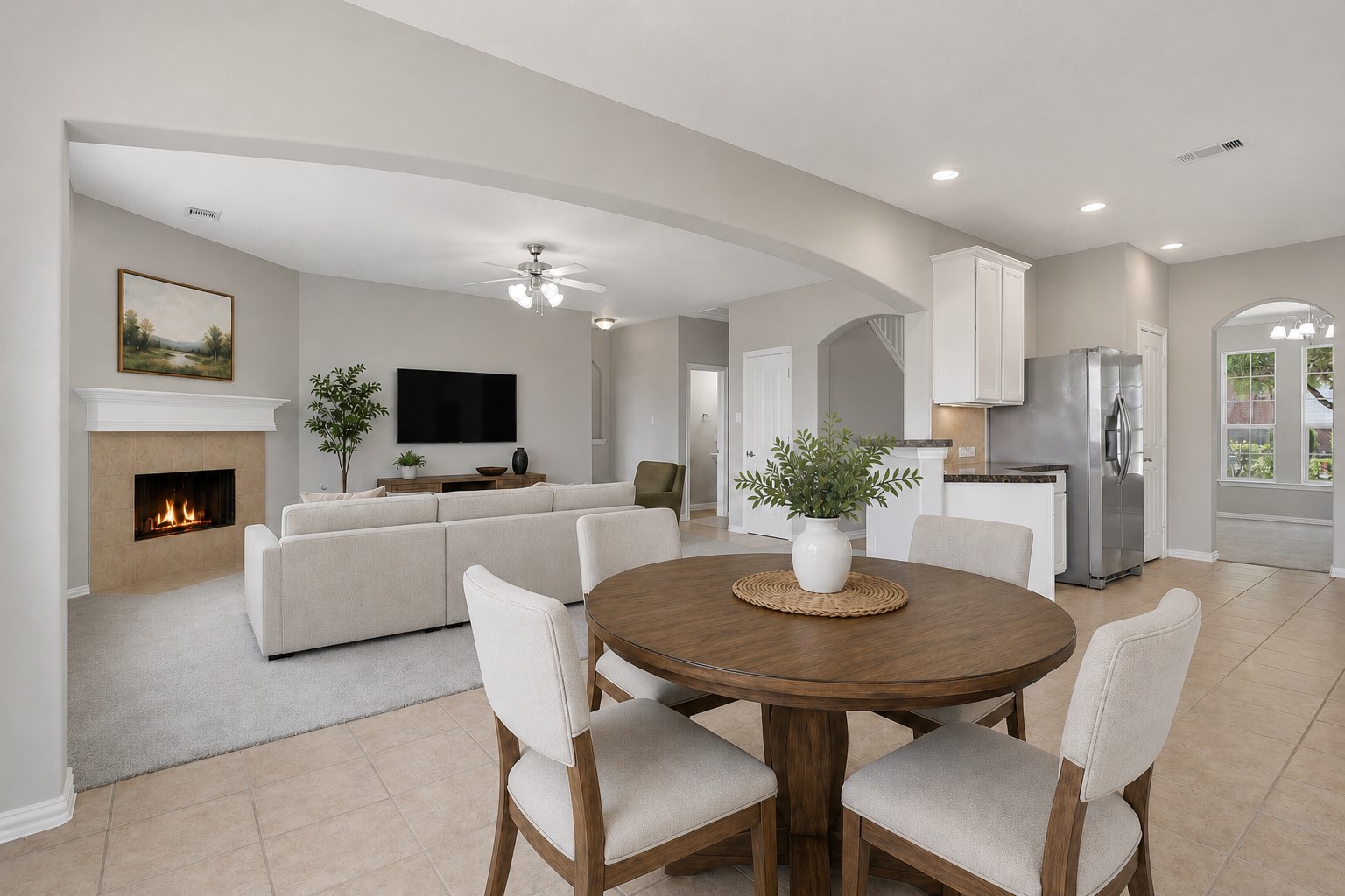 25926 Morgan Springs Spring, TX 77373 - Photo 15 of 49 The bright breakfast room offers the perfect place to enjoy casual meals while overlooking the open-concept living spaces. Its seamless connection to the kitchen and family room creates an ideal layout for both everyday living and entertaining. **Photo is Virtually Staged**