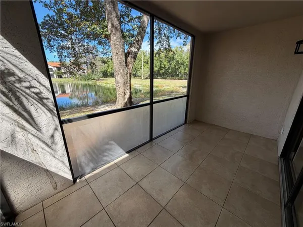 a view of a room with a large window