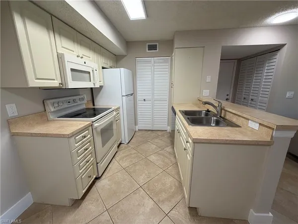 a utility room with washer and dryer