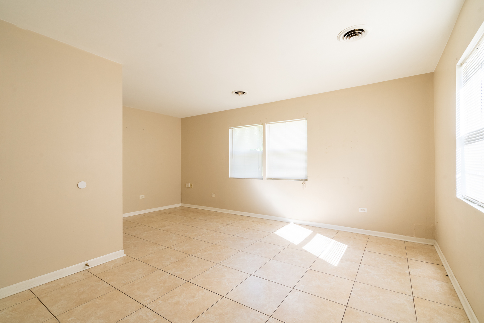 357 Neola Street Park Forest, IL 60466 - Photo 18 of 22 a view of an empty room with a window