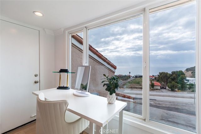 a dinning table and chairs in a patio