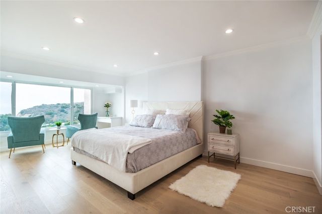 a bed room with a bed and a table