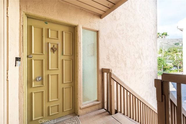 a view of a porch with a door