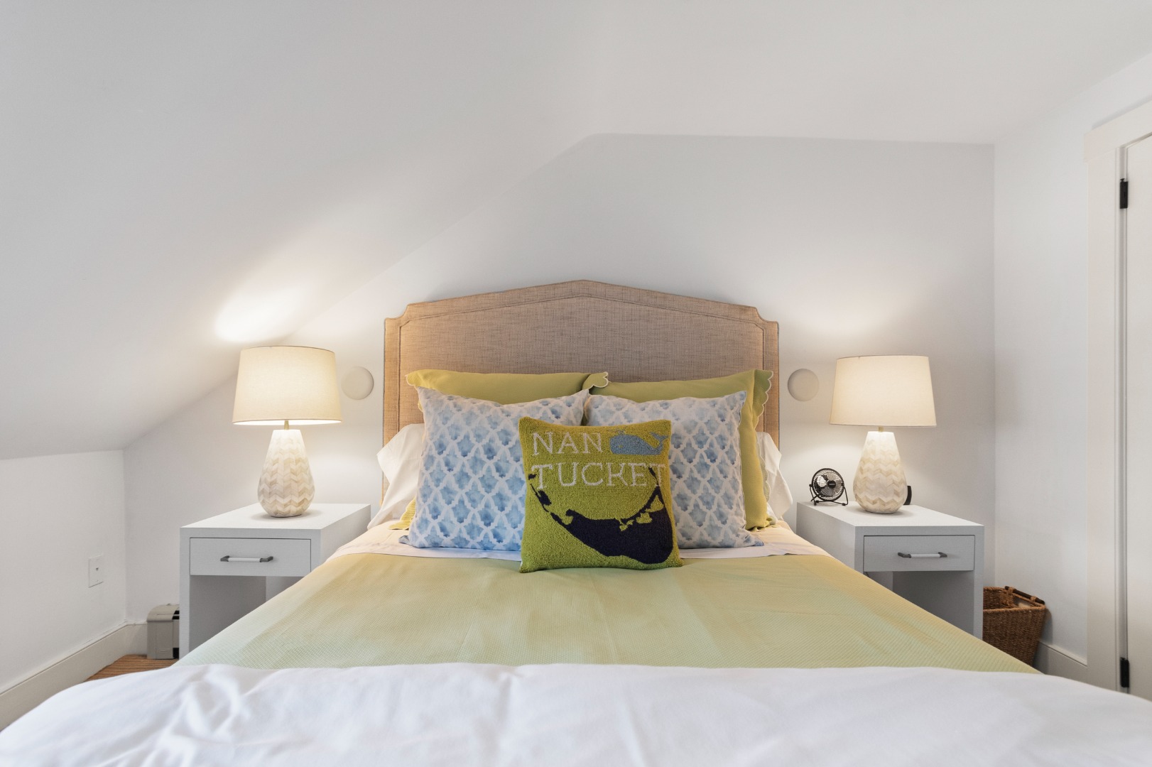 19 Orange Street Nantucket, MA 02554 - Photo 53 of 85 a bedroom with a bed and a lamp