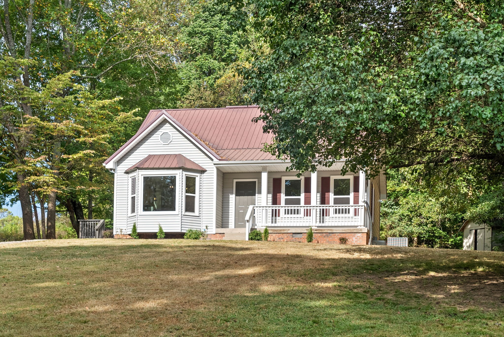 2212 Bend Road Clarksville, TN 37040 - Photo 2 of 32 a front view of a house with a garden