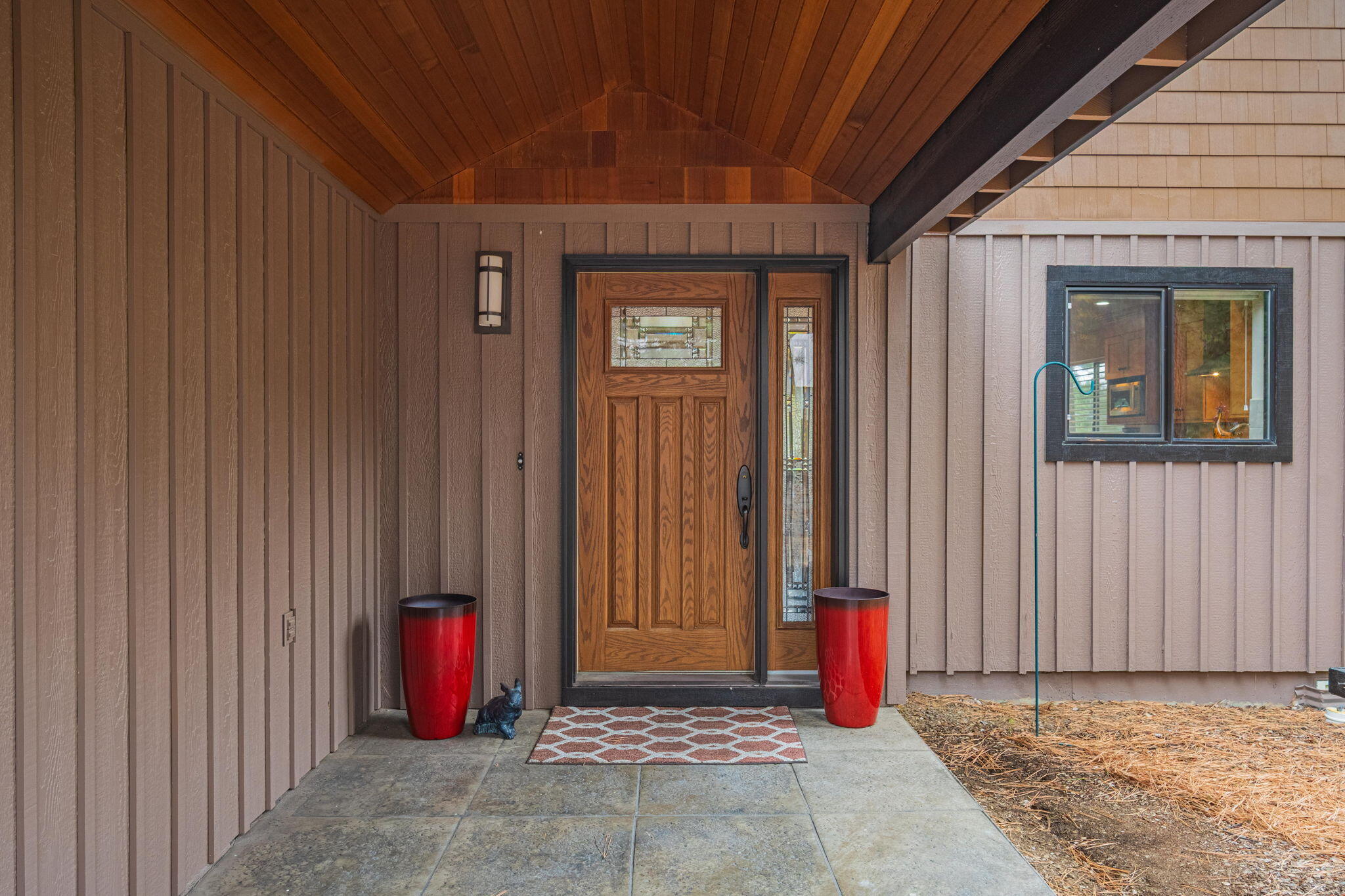 56019 Snow Goose Road Bend, OR 97707 - Photo 14 of 32 a view of a entrance door of the house