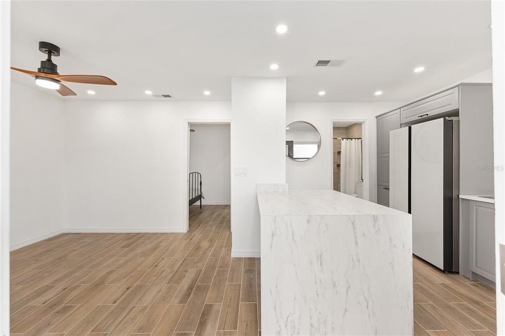 2437 Northeast 6th Street, Unit 14 Ocala, FL 34470 - Photo 7 of 22 a view of a kitchen with a refrigerator and a sink
