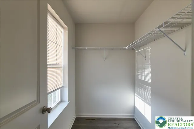 a view of an empty room and window