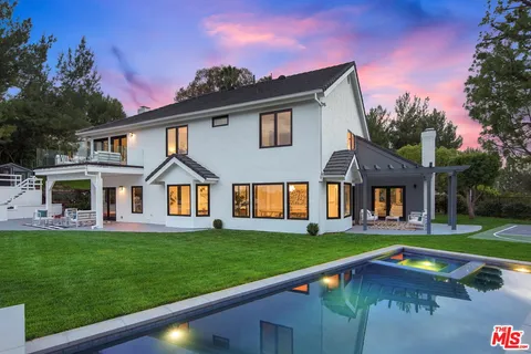 a view of a house with a big yard