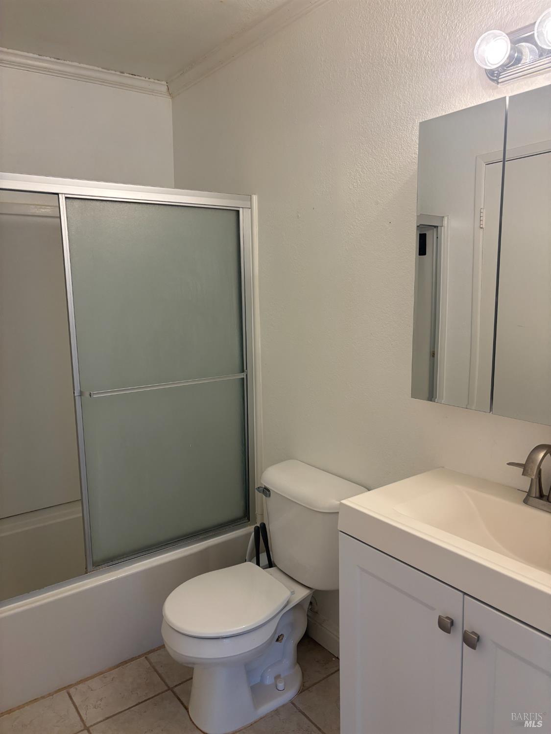 221 College View Drive Rohnert Park, CA 94928 - Photo 11 of 12 a white toilet sitting next to a bathroom sink