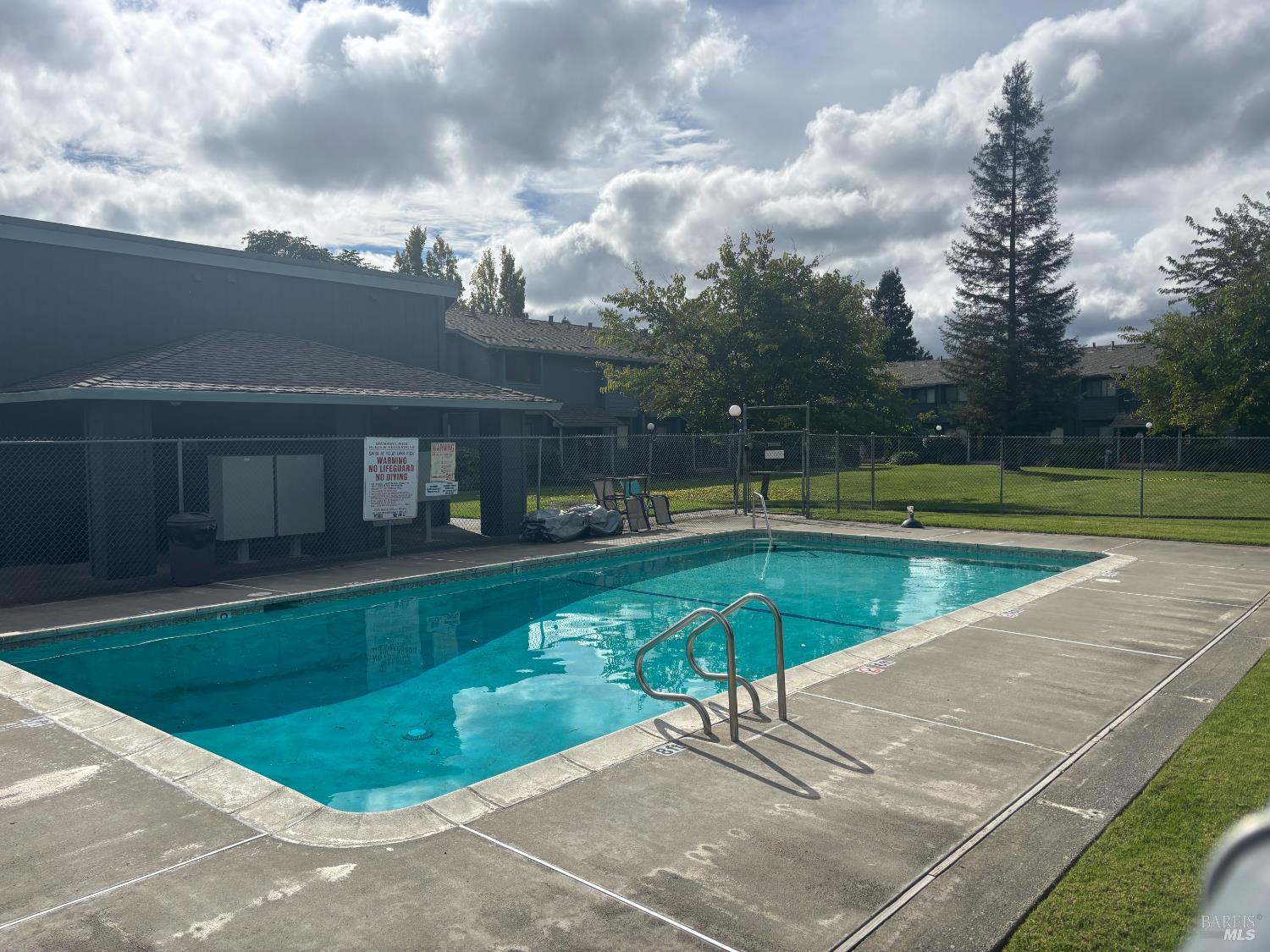 221 College View Drive Rohnert Park, CA 94928 - Photo 12 of 12 a view of a swimming pool with a yard