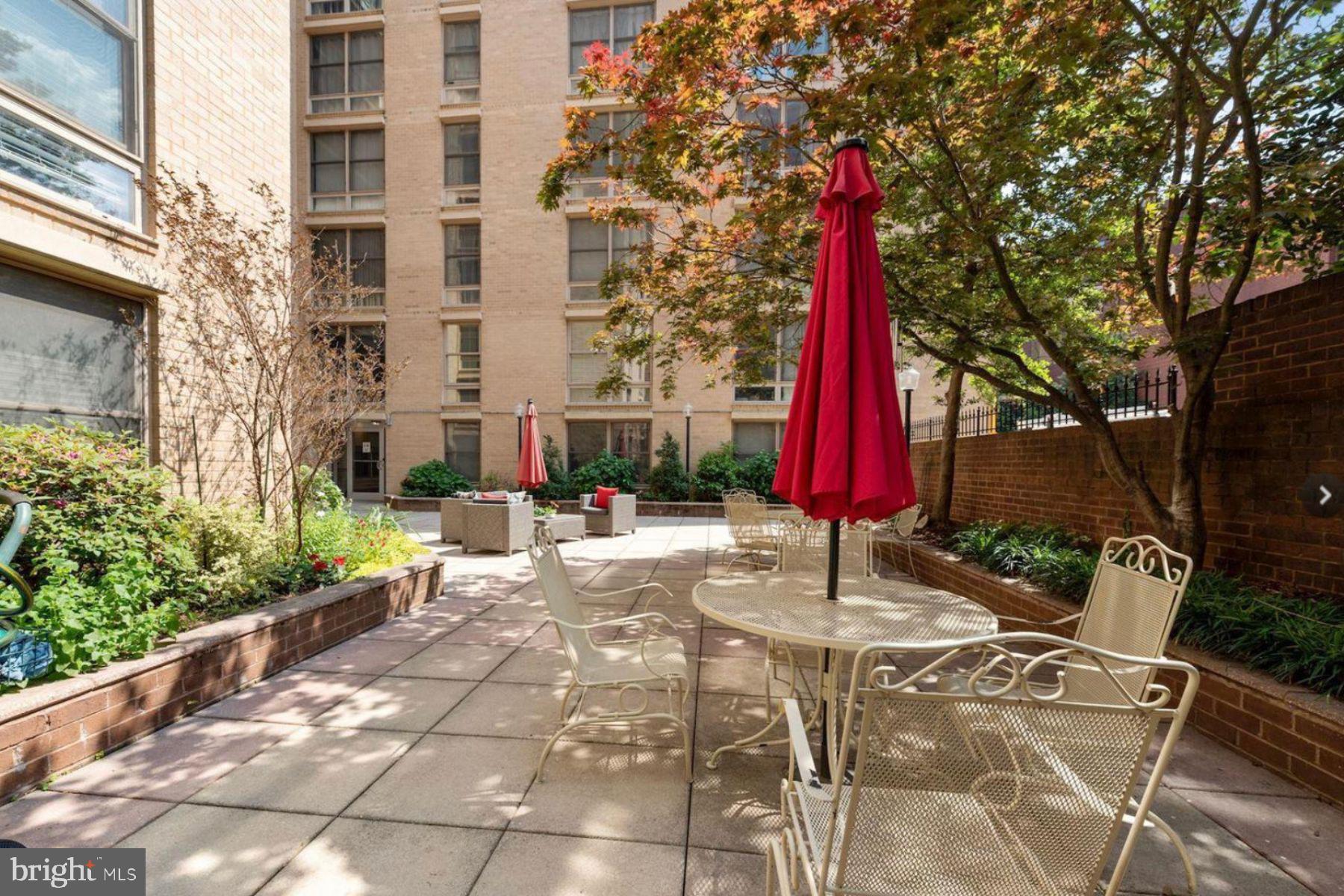 1260 21st Street Northwest, Unit 208 Washington, DC 20036 - Photo 18 of 25 a view of a park with iron fence