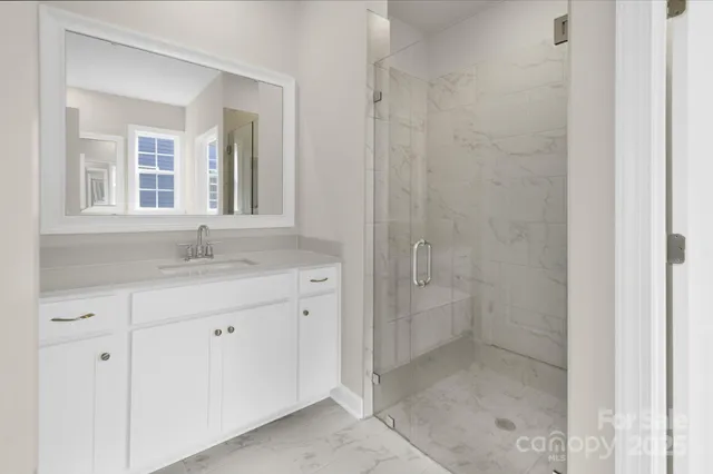 a view of cabinets and window