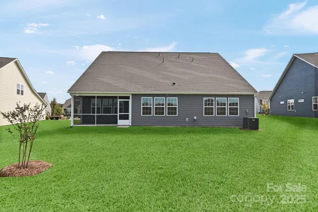 a view of a house with a big yard