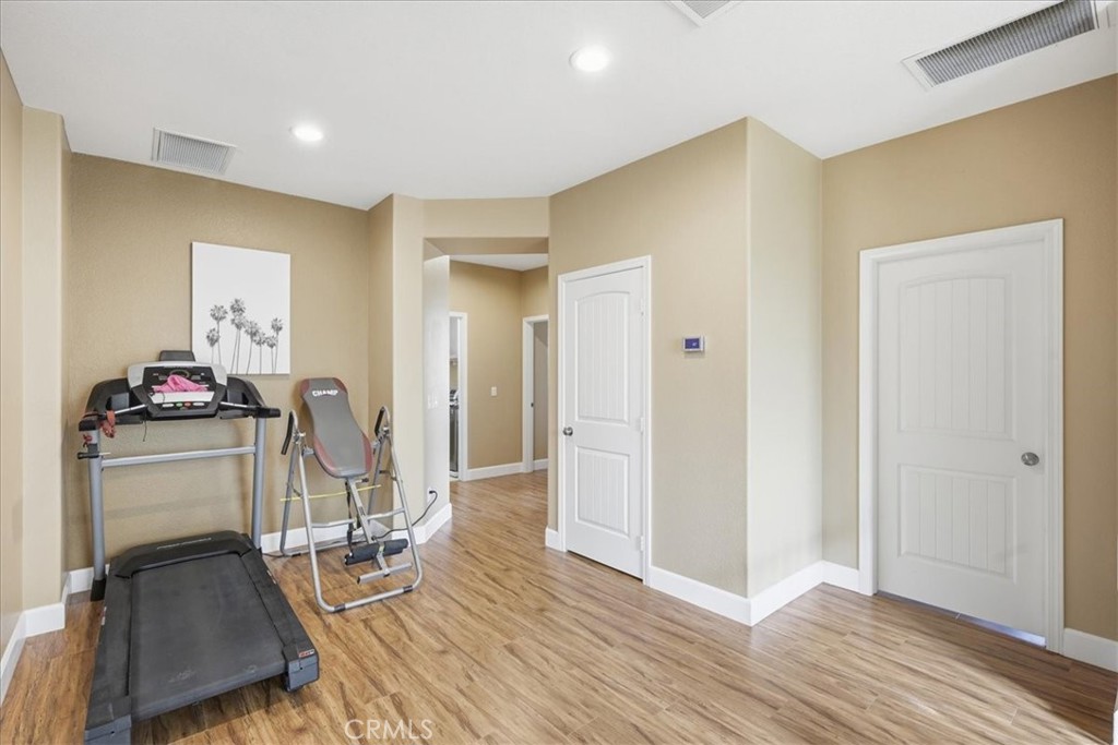 32623 Ritter Court Temecula, CA 92592 - Photo 21 of 40 a view of a livingroom with furniture and wooden floor