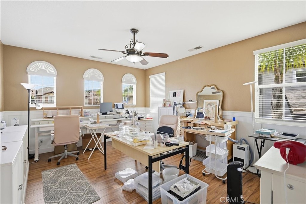 32623 Ritter Court Temecula, CA 92592 - Photo 23 of 40 a living room with lots of furniture and a large window