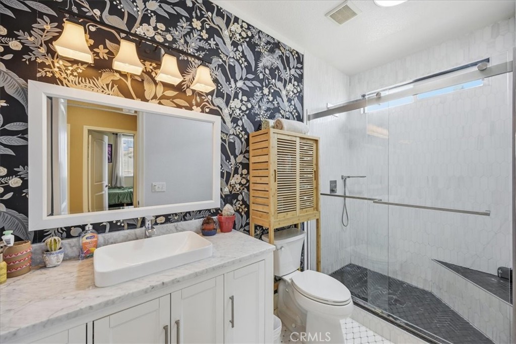 32623 Ritter Court Temecula, CA 92592 - Photo 24 of 40 a bathroom with a sink toilet and shower