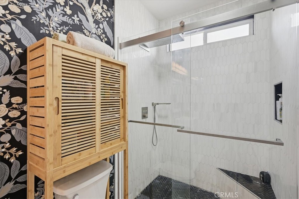 32623 Ritter Court Temecula, CA 92592 - Photo 25 of 40 a view of a room with rack on the wall and a window
