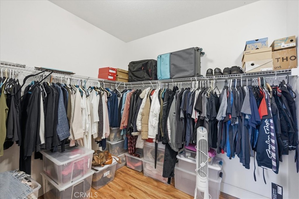 32623 Ritter Court Temecula, CA 92592 - Photo 29 of 40 a view of walk in closet with clothes