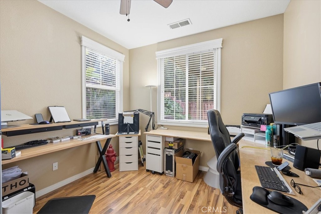 32623 Ritter Court Temecula, CA 92592 - Photo 32 of 40 a view of a workspace with furniture and a window